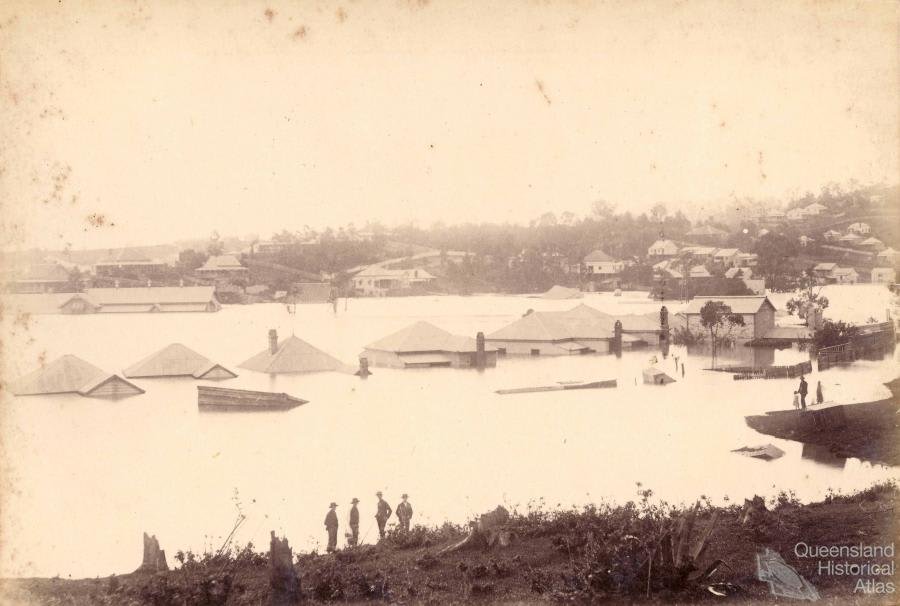1893 flood: submerged houses with only roofs and chimneys visible; figures on a raised bank in the foreground
